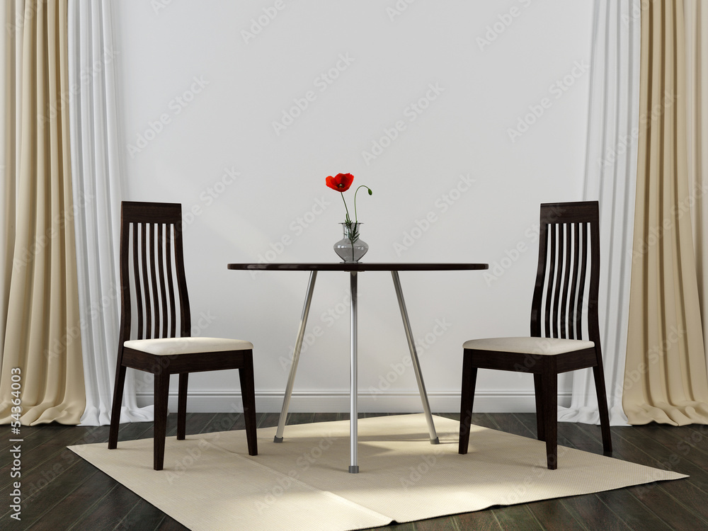 Two black chairs and a table