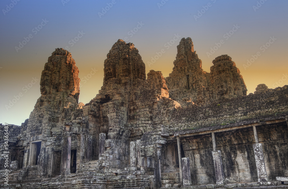 Bayon temple at sunset in Angkor Cambodia
