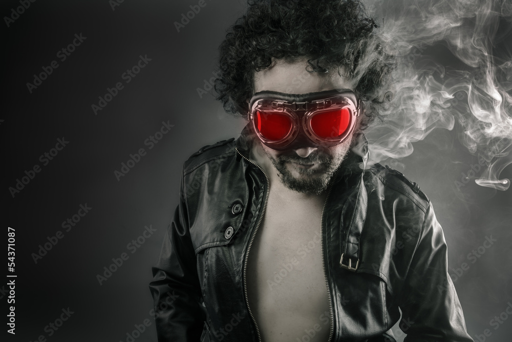 Man with leather jacket and smoke coming out of your body heat c Man with leather jacket and smoke coming out of your body heat c