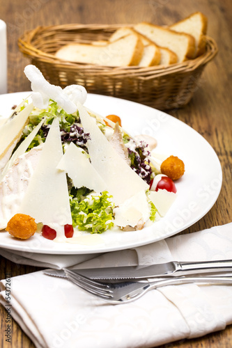 Caesar salad on the table in a restaurant