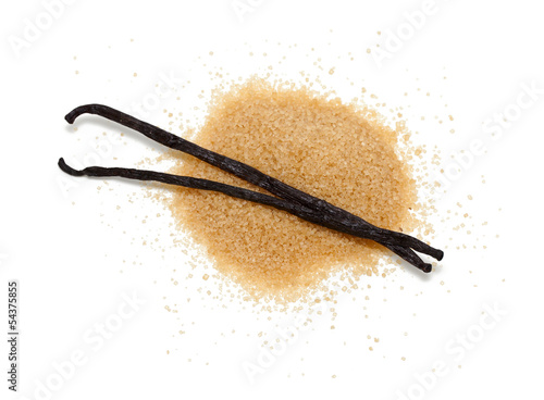 vanilla beans and brown vanilla sugar isolated on white backgrou photo