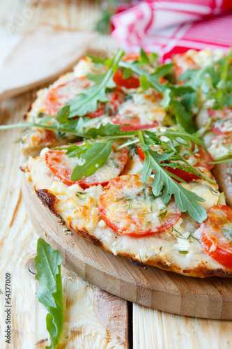 thick margarita pizza with tomatoes