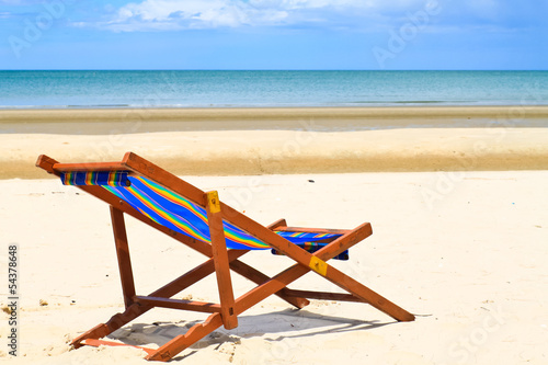 Empty Chairs on beach.