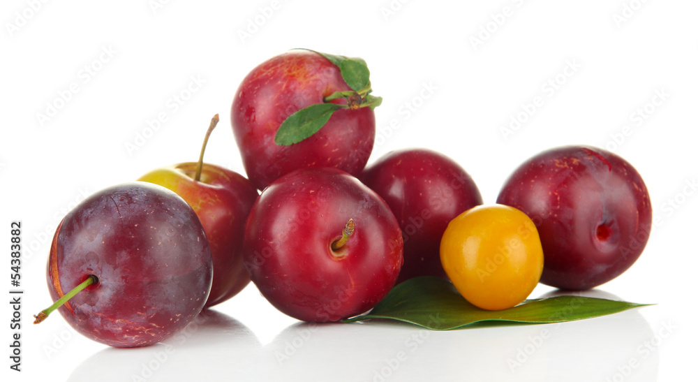 Ripe plums isolated on white Ripe plums isolated on white