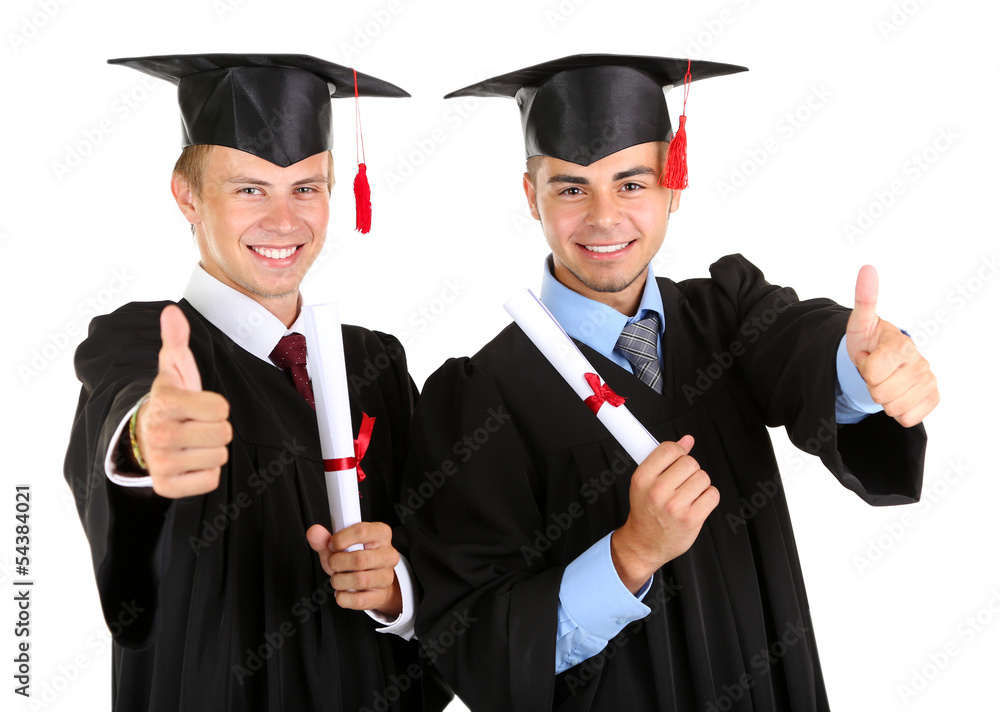 Two happy graduating students isolated on white Two happy graduating students isolated on white