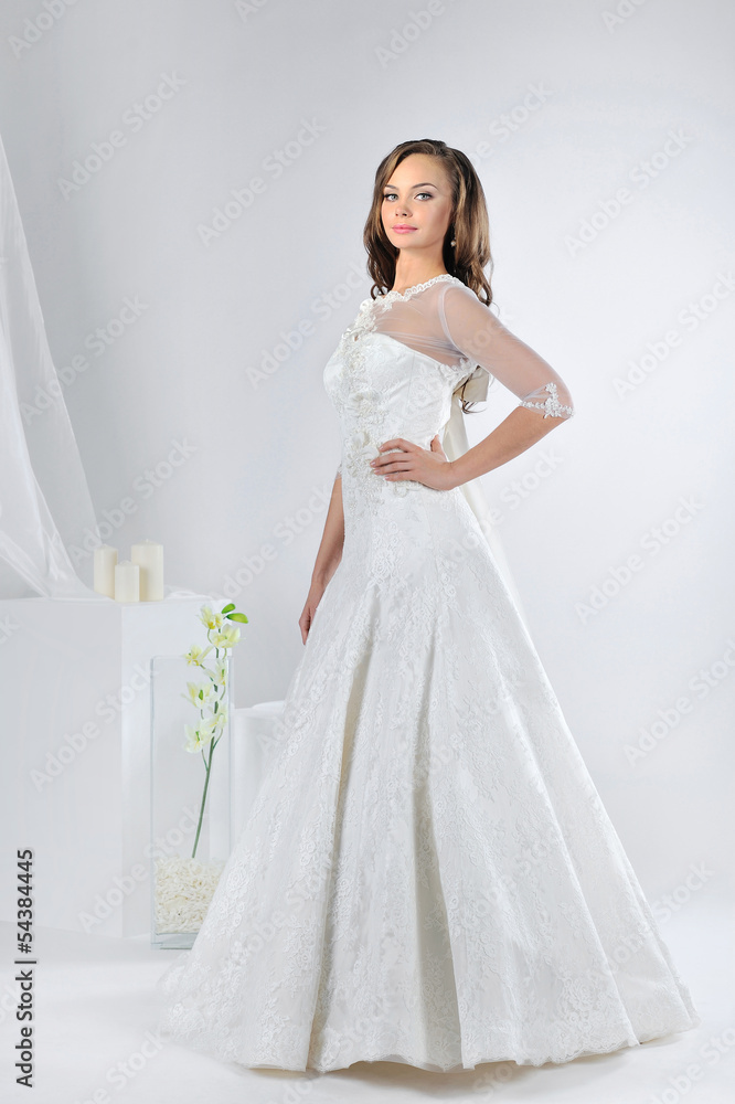 Beautiful bride in a luxurious wedding dress Beautiful bride in a luxurious wedding dress