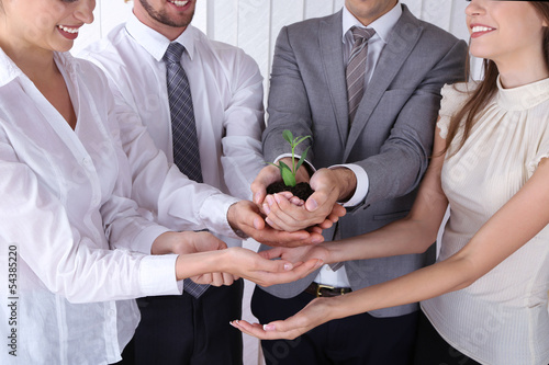 Business team holding toget...
