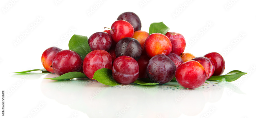 Ripe plums isolated on white Ripe plums isolated on white