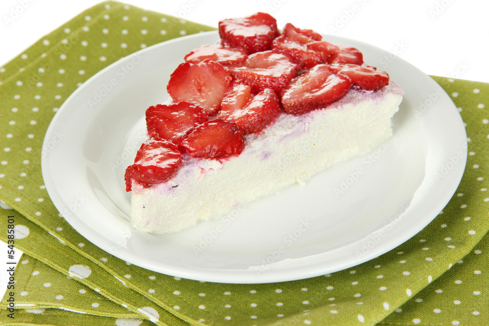 Cheesecake with fresh berries on white plate closeup Cheesecake with fresh berries on white plate closeup