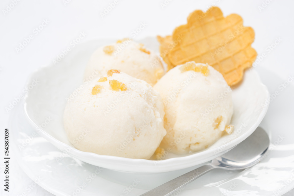 Close-up of ginger ice cream with melted milk and thin waffles Close-up of ginger ice cream with melted milk and thin waffles