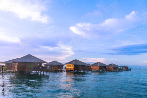 Over water bungalow with bule sky