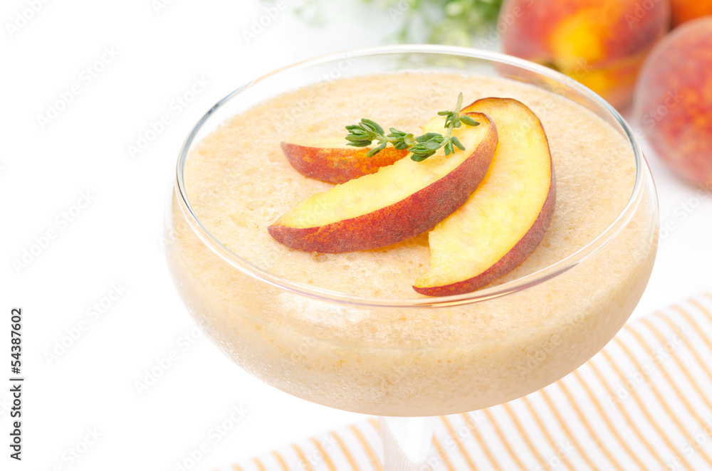 peach souffle in glass, isolated, close-up peach souffle in glass, isolated, close-up