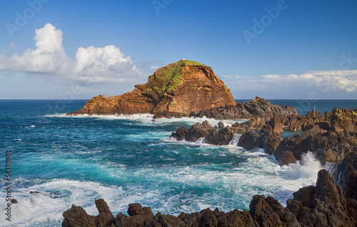 Seascape with lava rocks on...