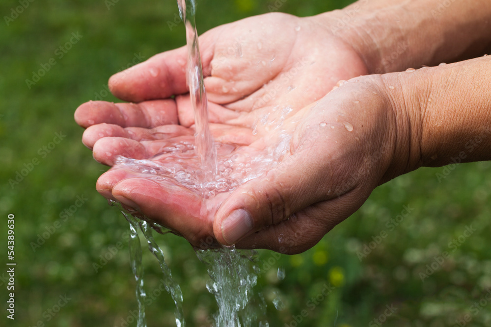 Hands and water.