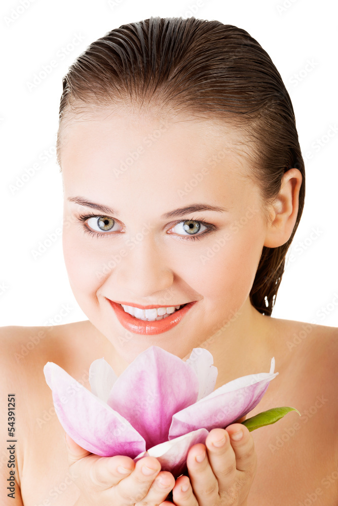 Beauty face of the young beautiful woman with flower. Beauty face of the young beautiful woman with flower.