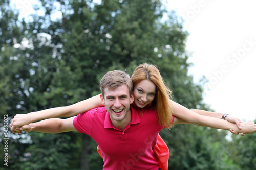 Happy young couple in love at the park © Andrey_Arkusha