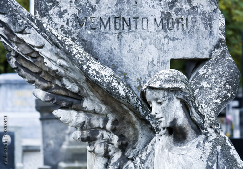 An 19th century antique art on cemetery in Warsaw. Poland.