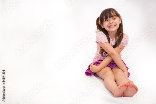Tableau sur toile bambina che ride nella sua stanza da giochi