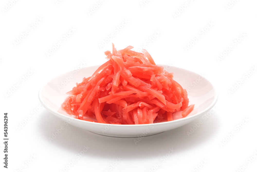 Red pickled ginger on white background