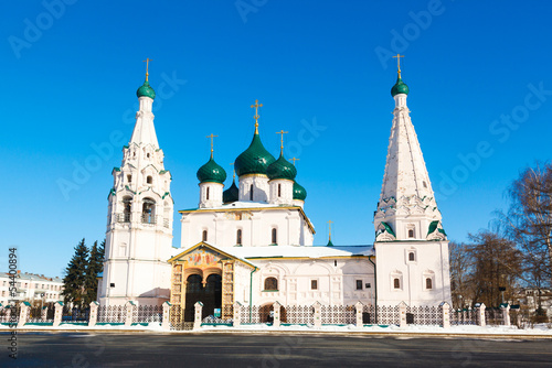white steeple church with domes and walls