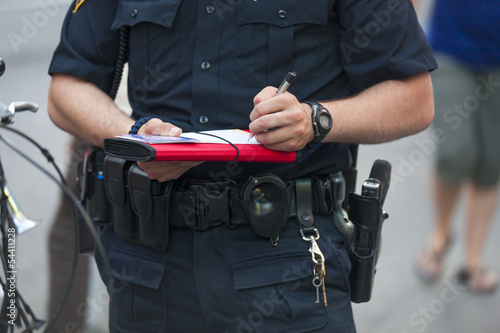 Canvas Print Police writes ticket