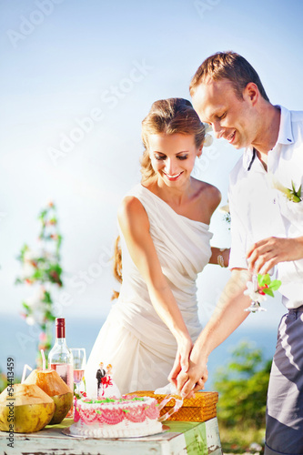 adorable couple in sunlight on their wedding day  sort focus 