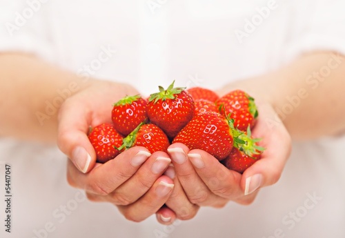 Hand Full of Strawberries