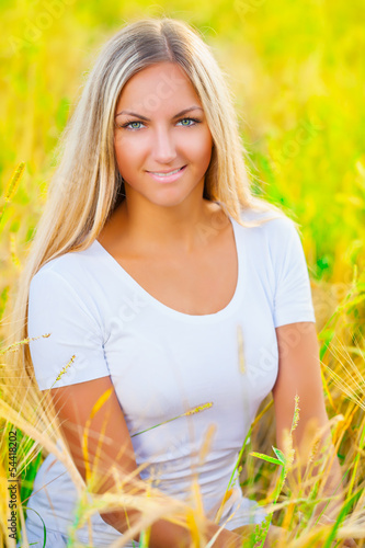 a nice blonde wearing white clothes