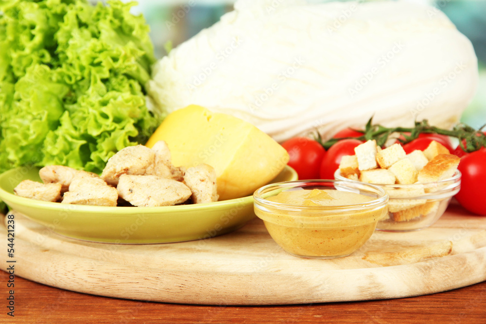 Ingredients for Caesar salad on bright background Ingredients for Caesar salad on bright background