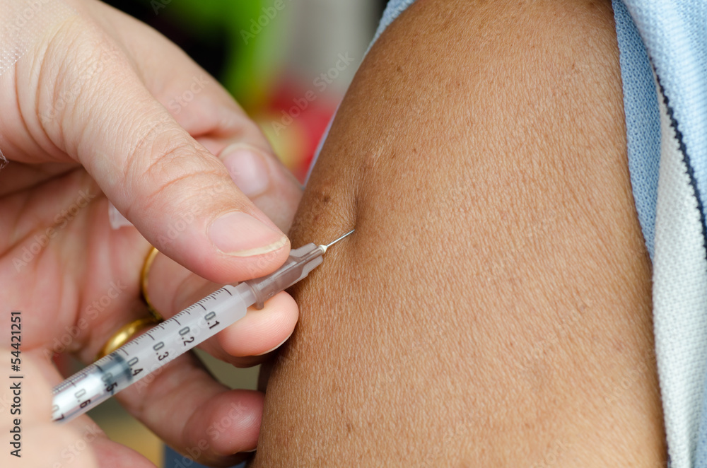 closeup of injection vaccine closeup of injection vaccine