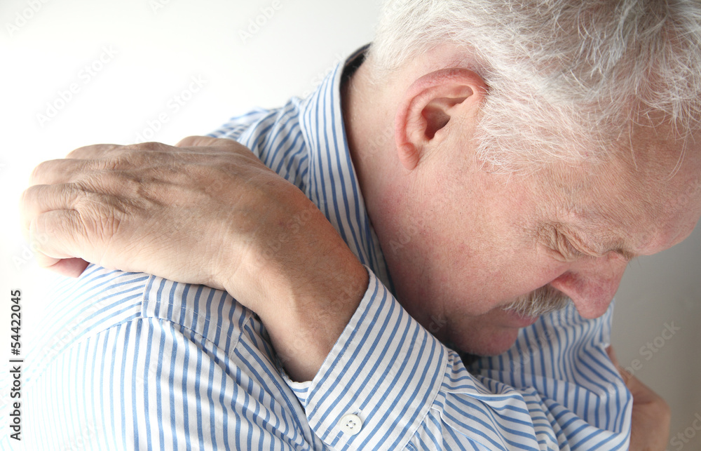 senior reaches to scratch his back senior reaches to scratch his back