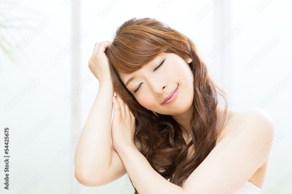 Beautiful young woman relaxing in the room Beautiful young woman relaxing in the room