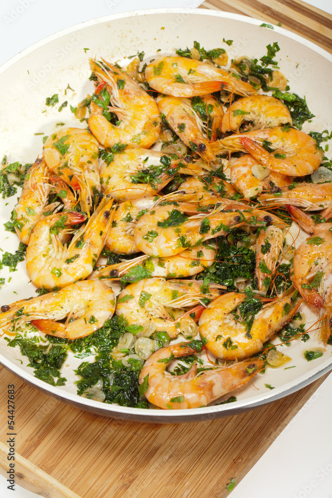 Fried shrimps with the garlic and the parsley Fried shrimps with the garlic and the parsley