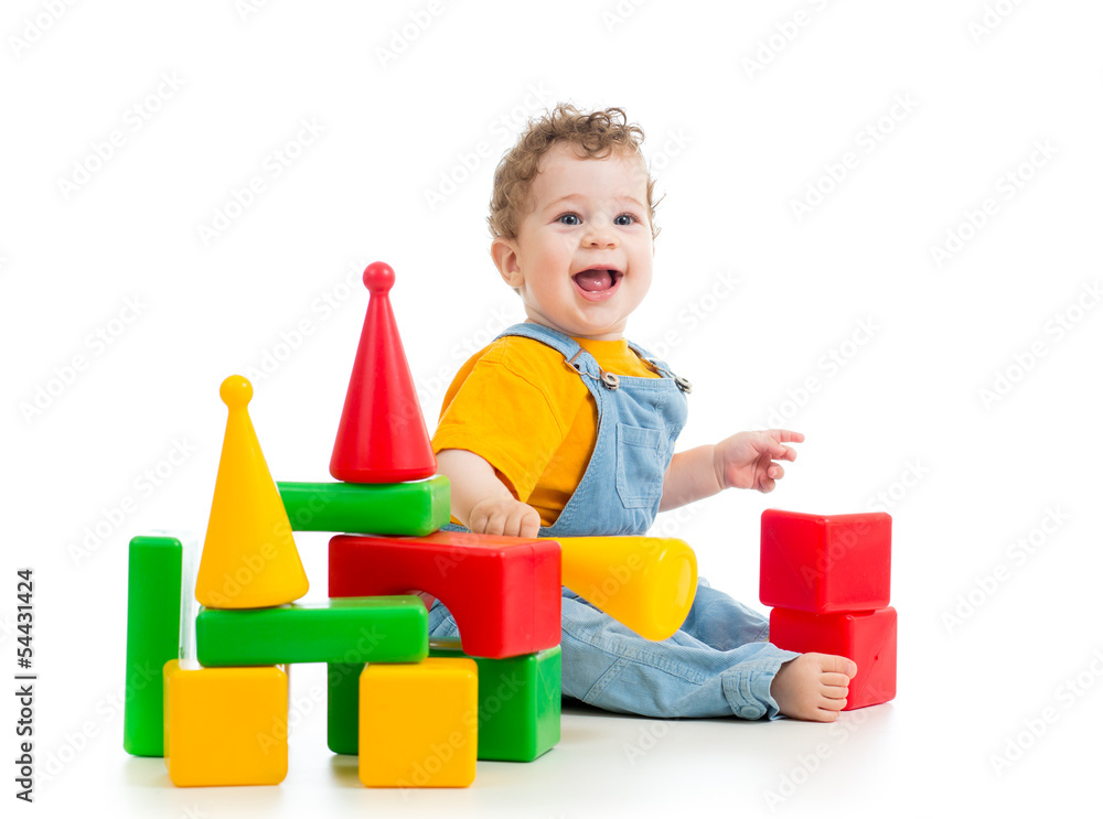 smiling child playing building blocks smiling child playing building blocks