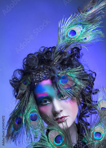 Woman in peacock image.