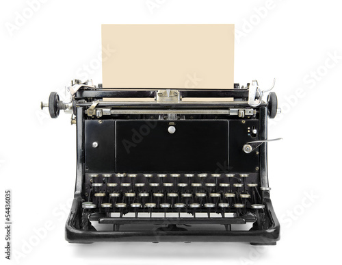 Typewriter with blank sheet isolated on white.