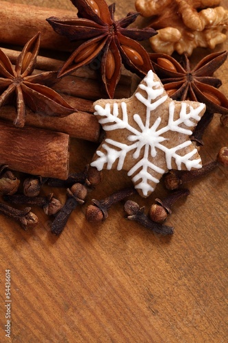 Fototapeta Naklejka Na Ścianę i Meble -  Gingerbread stars, spices and nut