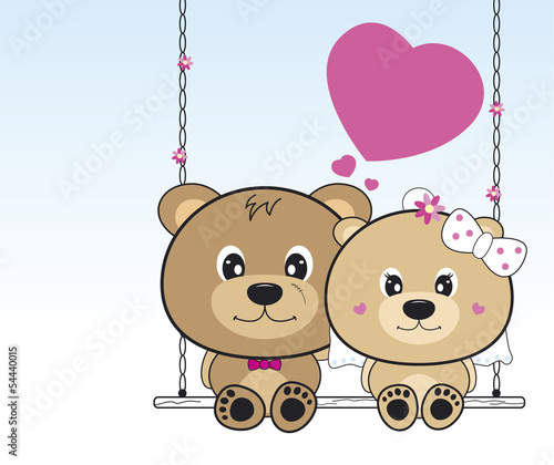 Wedding bears sitting on a swing