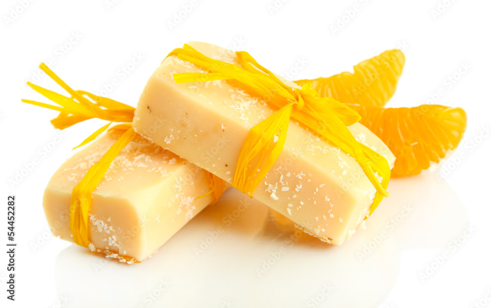 Natural handmade soap and orange, isolated on white Natural handmade soap and orange, isolated on white