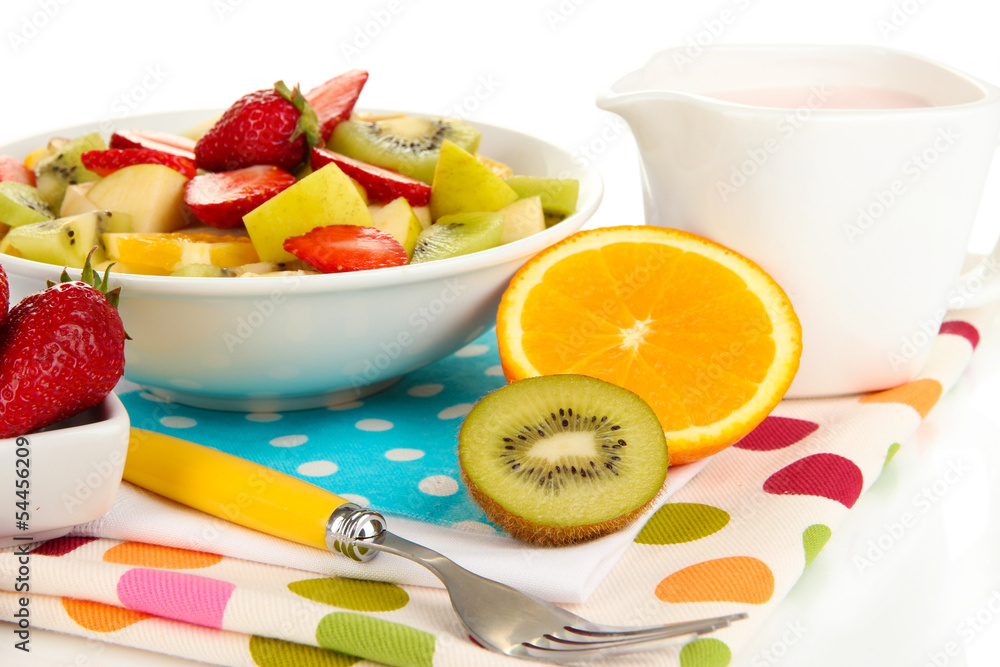 Useful fruit salad of fresh fruits and berries in bowl isolated Useful fruit salad of fresh fruits and berries in bowl isolated