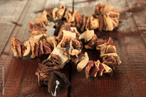 Dried mushrooms on wooden background