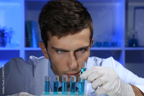 Young laboratory scientist working at lab