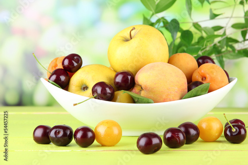 Bright summer fruits in plate