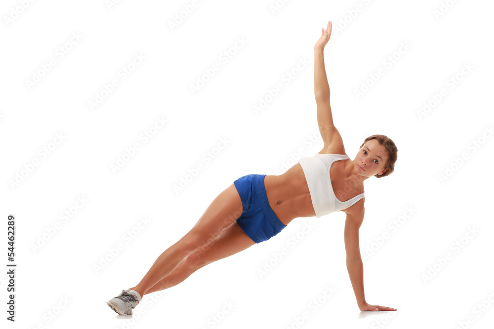 Young pretty fitness model doing abdominal exercises Young pretty fitness model doing abdominal exercises