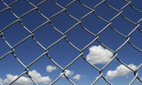 Blue Sky and Clouds with chain link