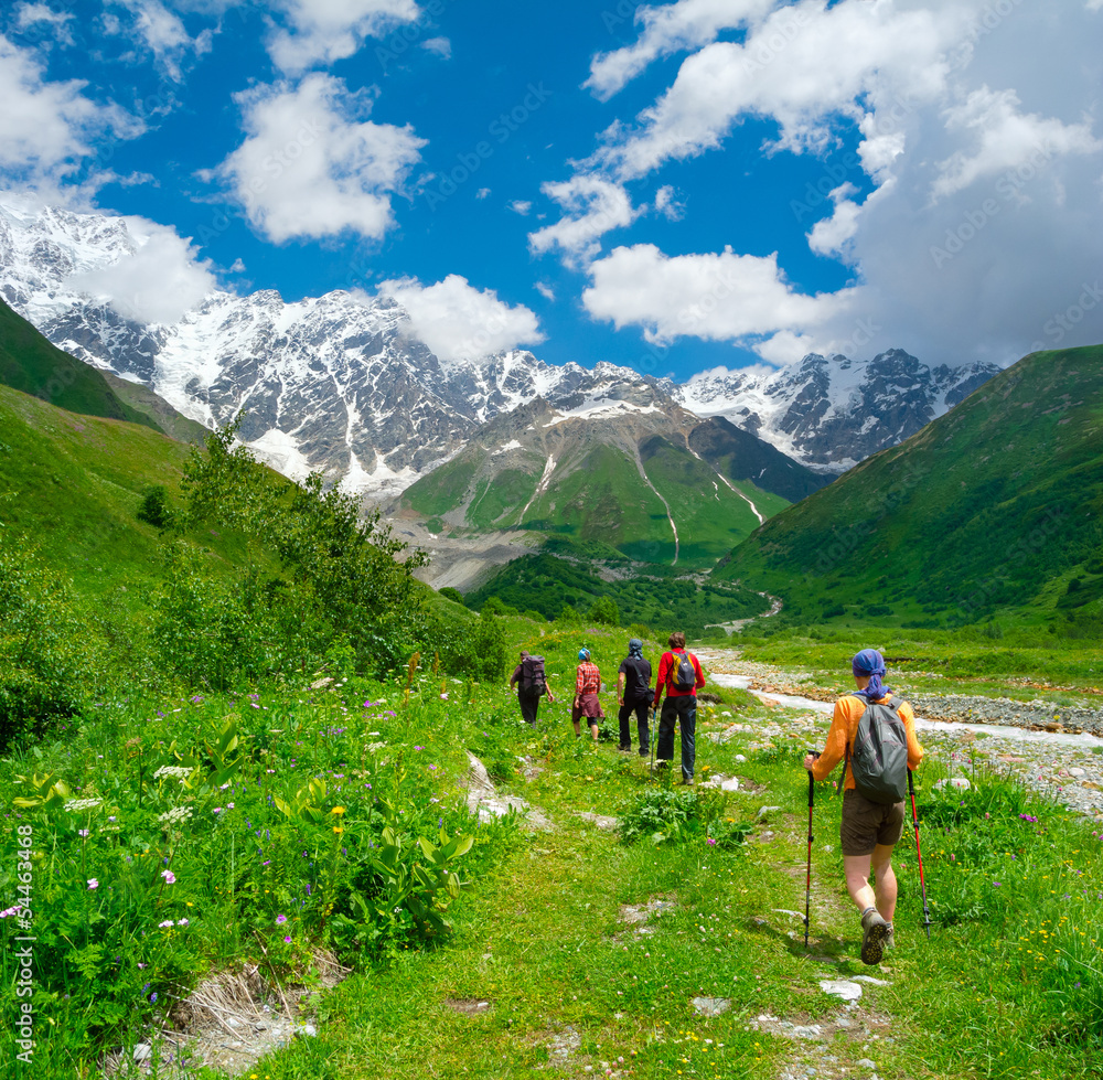 Young hikers trekking in Svaneti Young hikers trekking in Svaneti