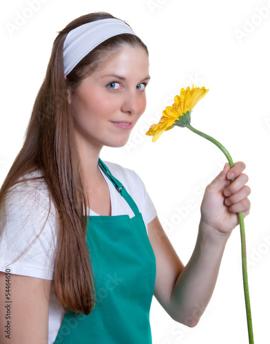 Blumenverkäuferin mit gelber Blume photo