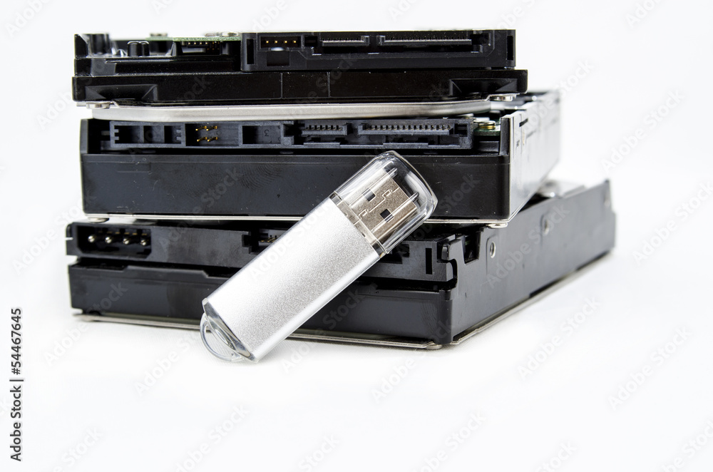 Harddisks And USB Drive Isolated On White Background Harddisks And USB Drive Isolated On White Background