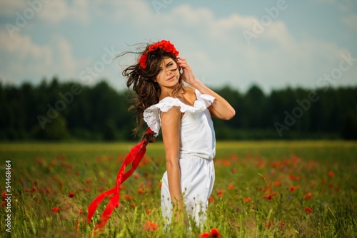 Wallpaper Mural Beautiful young brunette girl in poppy filed Torontodigital.ca