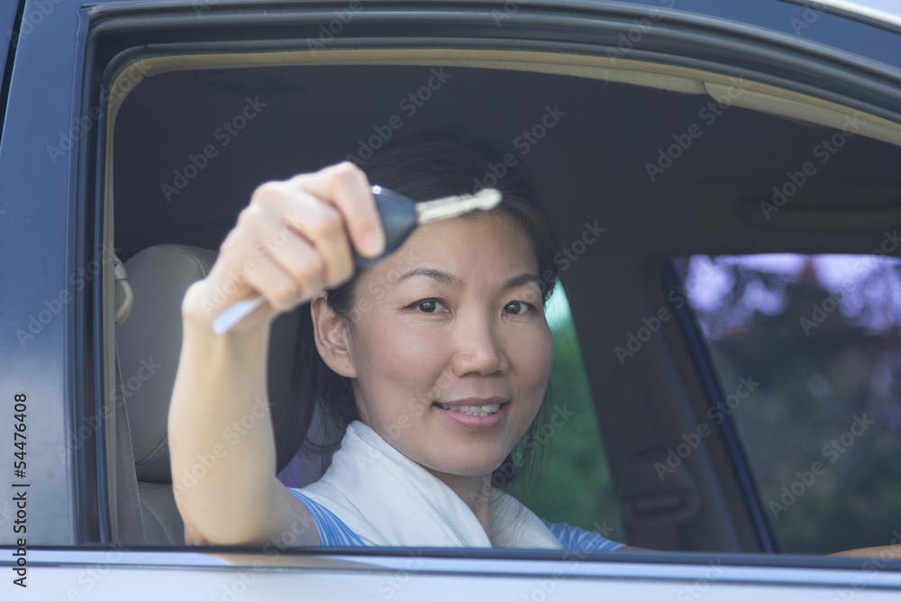 woman with car key